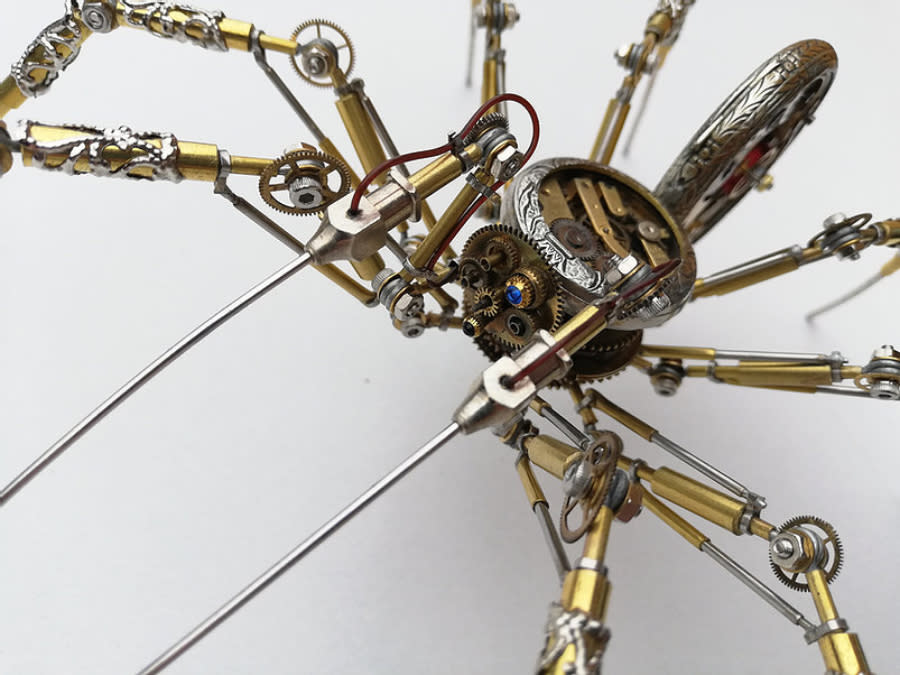 Hungarian artist, Peter Szucsy, makes stunning "steampunk spiders" out of antique watch parts.