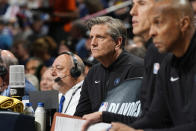 Minnesota Timberwolves head coach Chris Finch, center, looks on from the bench in the first half of Game 1 of an NBA basketball second-round playoff series against the Denver Nuggets, Saturday, May 4, 2024, in Denver. (AP Photo/David Zalubowski)