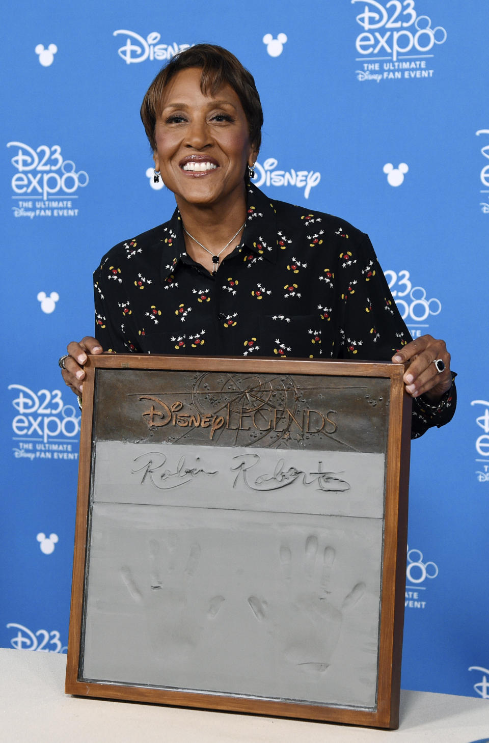 Television personality Robin Roberts poses during her handprint ceremony at the Disney Legends press line during the 2019 D23 Expo, Friday, Aug. 23, 2019, in Anaheim, Calif. (Photo by Chris Pizzello/Invision/AP)