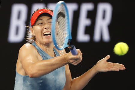 Tennis - Australian Open - Third Round - Melbourne Park, Melbourne, Australia, January 18, 2019. Russia's Maria Sharapova in action during the match against Denmark's Caroline Wozniacki. REUTERS/Aly Song