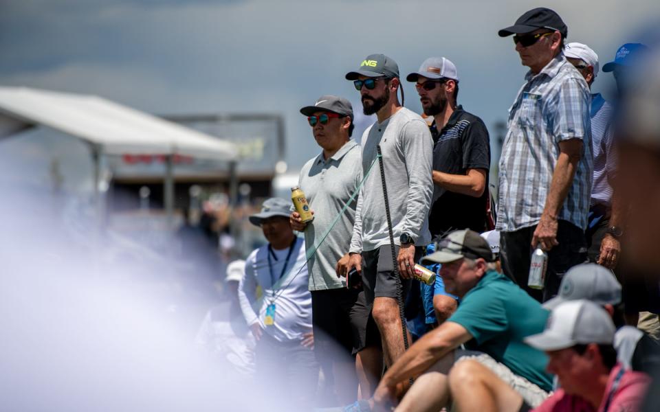 Spectators watch as Korn Ferry Tour professional golfers compete during the final round of The Ascendant at TPC Colorado in Berthoud on July 3, 2022.
