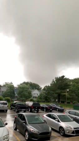 A tornado funnel cloud is seen over an area in South Bend, Indiana