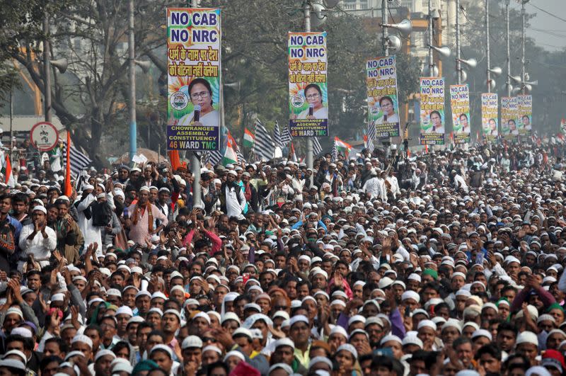 People attend a protest against a new citizenship law, in Kolkata