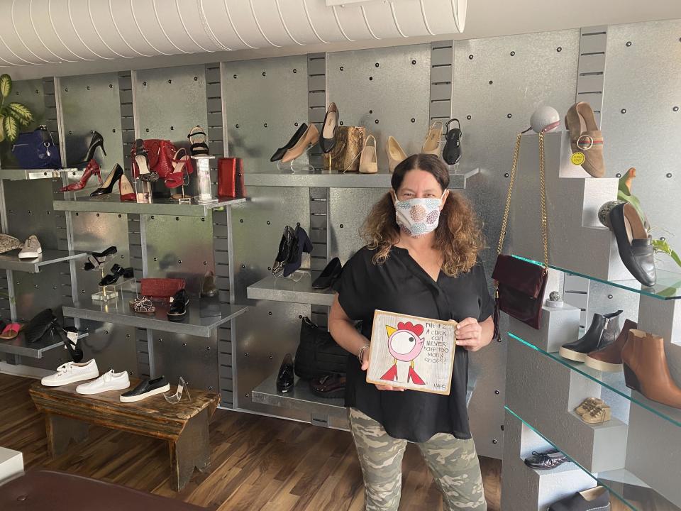 Lisa Rubinstein, in her shoe store, Footloose, Pittsburgh. / Credit: Lisa Rubinstein