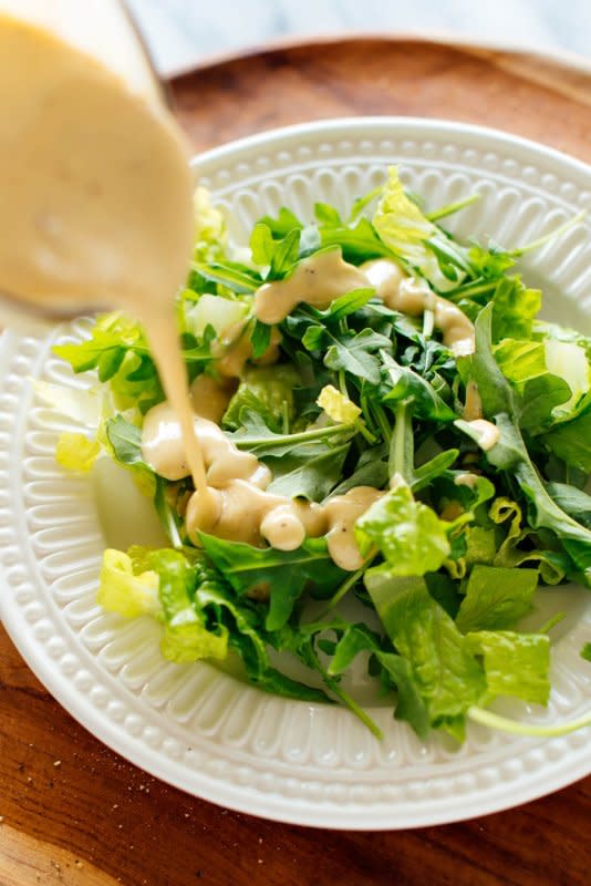 <p>Cookie and Kate</p><p>You’re going to love this delicious creamy tahini dressing recipe! It’s simple to make, full of nutritious ingredients and goes with everything.</p><p><strong>Get the recipe: <a href="https://cookieandkate.com/creamy-tahini-dressing-recipe/" rel="nofollow noopener" target="_blank" data-ylk="slk:Creamy Tahini Dressing;elm:context_link;itc:0;sec:content-canvas" class="link rapid-noclick-resp">Creamy Tahini Dressing</a></strong></p>