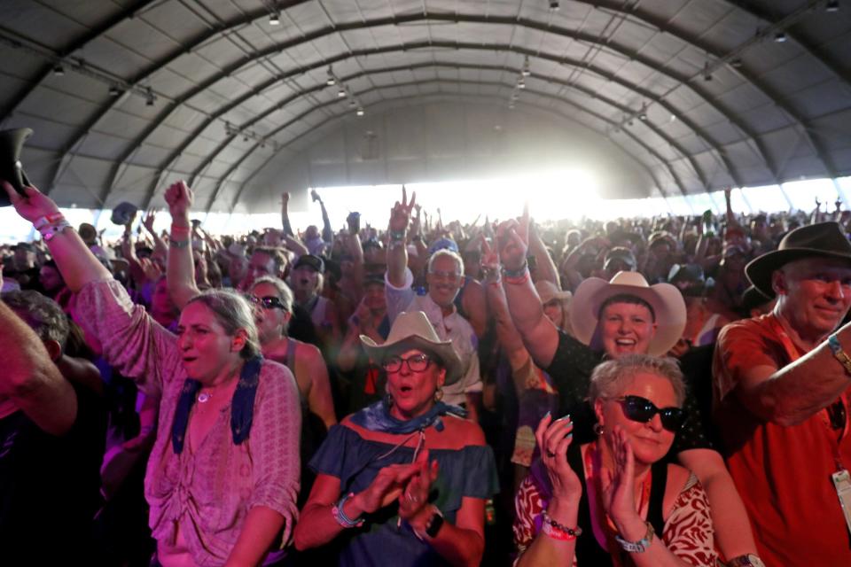 Fans cheer as Melissa Etheridge performs on the Palomino stage during Stagecoach country music festival at the Empire Polo Club in Indio, Calif., on Friday, April 28, 2023.