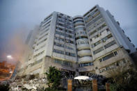 A damaged residential building is seen after an earthquake hit Hualien, Taiwan February 7, 2018. REUTERS/Tyrone Siu