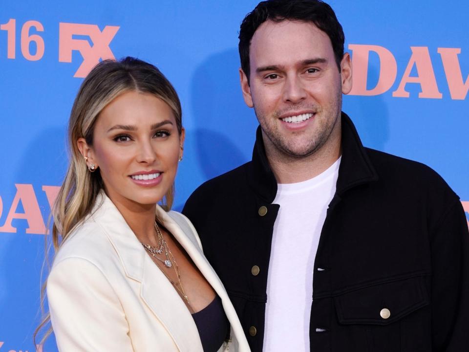 Yael Cohen and Scooter Braun posing at the season two premiere of "Dave" in Los Angeles in June 2021.