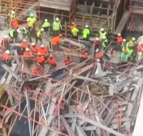 Footage shows workers rushing to the aid of their colleagues. Source: 7News