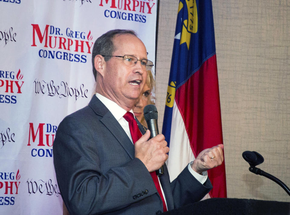 FILE - In this Tuesday, July 9, 2019 file photo, Greg Murphy speaks after he was announced the winner of the Republican nomination in North Carolina's 3rd Congressional District at Greenville Convention Center in Greenville, N.C. Voters on Tuesday decide the successor to the late Rep. Walter Jones Jr. in the 3rd Congressional District. But residents were likely thinking more about weather than elections Thursday, Sept. 5, 2019 as Dorian approached with high winds and heavy rains. Early in-person voting in the district has been cut short due to the storm. (Molly Urbina/The Daily Reflector via AP, File)