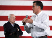 <p>Sen. John McCain listens at left as Republican presidential candidate former Massachusetts Gov. Mitt Romney speaks at a Boys and Girls Club, Jan. 5, 2012, in Salem, N.H. (Photo: Matt Rourke/AP) </p>