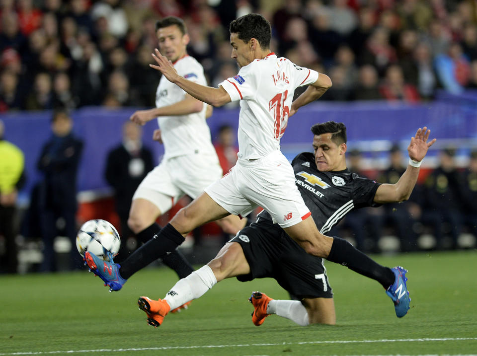 Alexis Sanchez makes a tackle: Getty