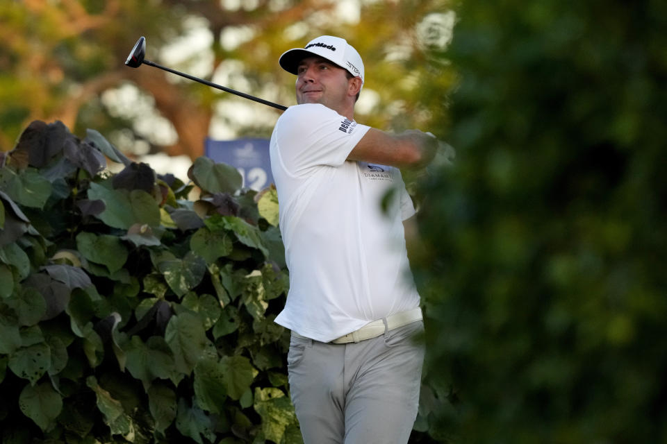 Taylor Montgomery plays his shot from the 18th tee during the first round of the Sony Open golf tournament, Thursday, Jan. 12, 2023, at Waialae Country Club in Honolulu. (AP Photo/Matt York)