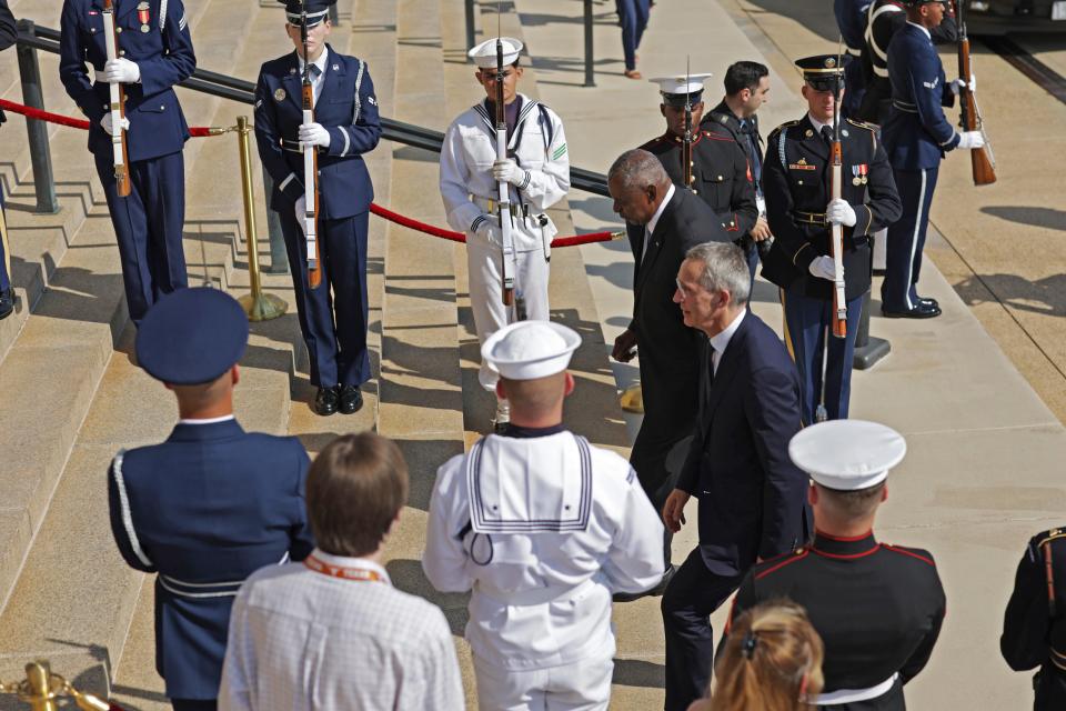U.S. Defense Secretary Lloyd Austin welcomes NATO Secretary General Jens Stoltenberg, wearing glasses, to the Pentagon outside Washington, D.C., on July 8, 2024.