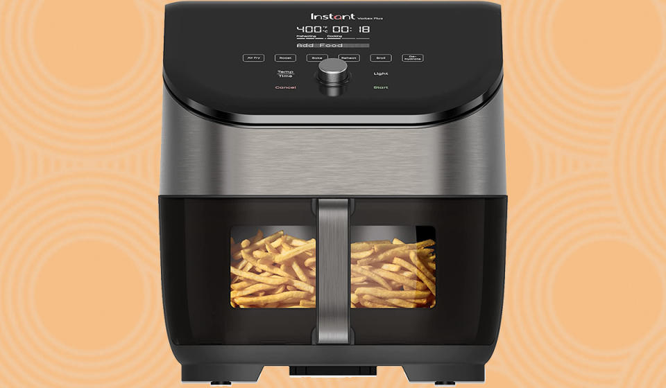 Instant Vortex Plus air fryer on an orange spiral background