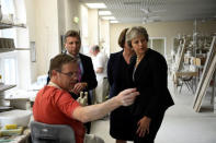 Britain's Prime Minister Theresa May and Arlene Foster, the leader of the Democratic Unionist Party (DUP) visit Belleek Pottery, in St Belleek, Fermanagh, Northern Ireland, July 19, 2018. REUTERS/Clodagh Kilcoyne