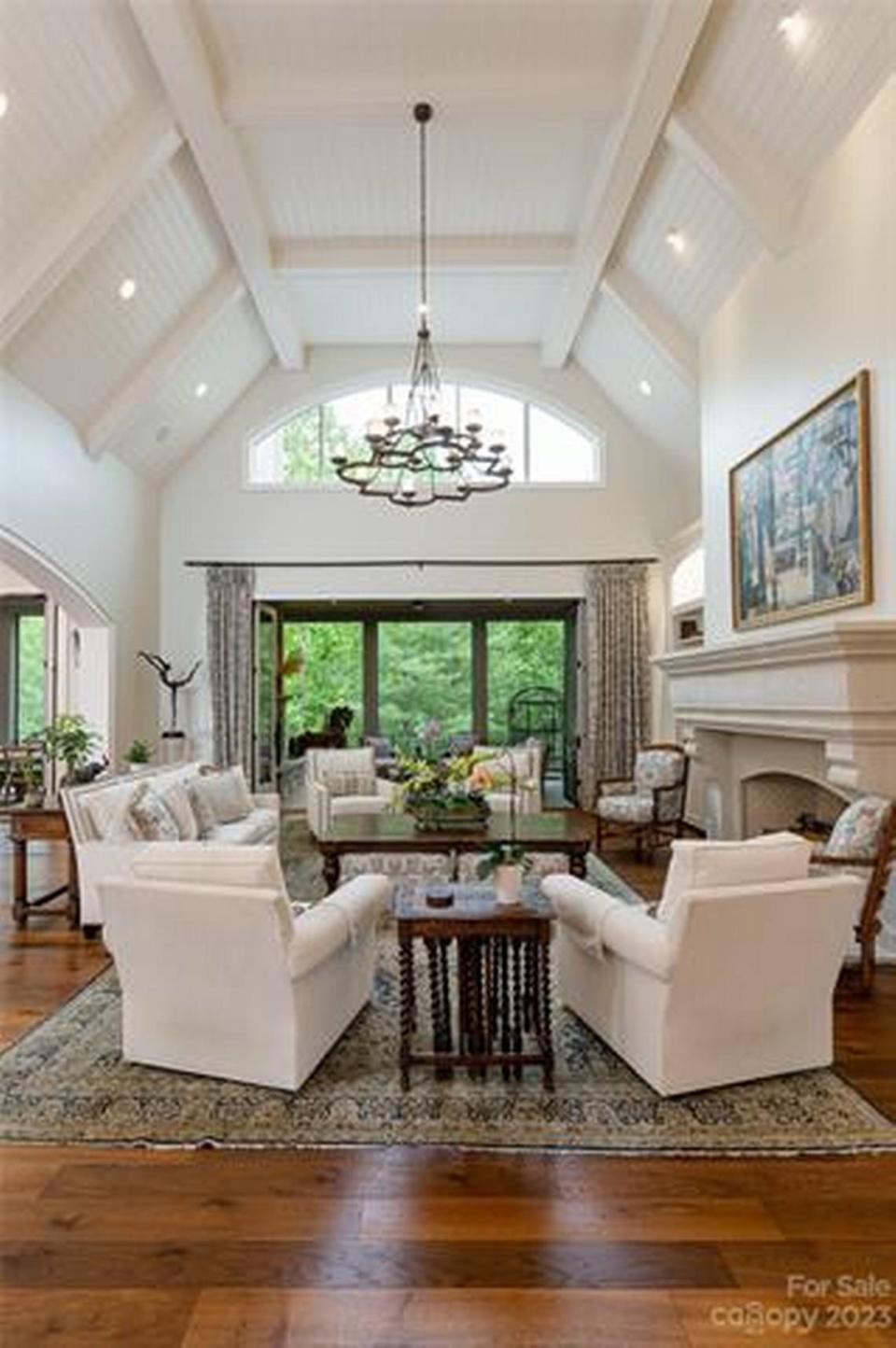 The grand entrance leads you into the foyer with soaring ceilings for a grand welcome.