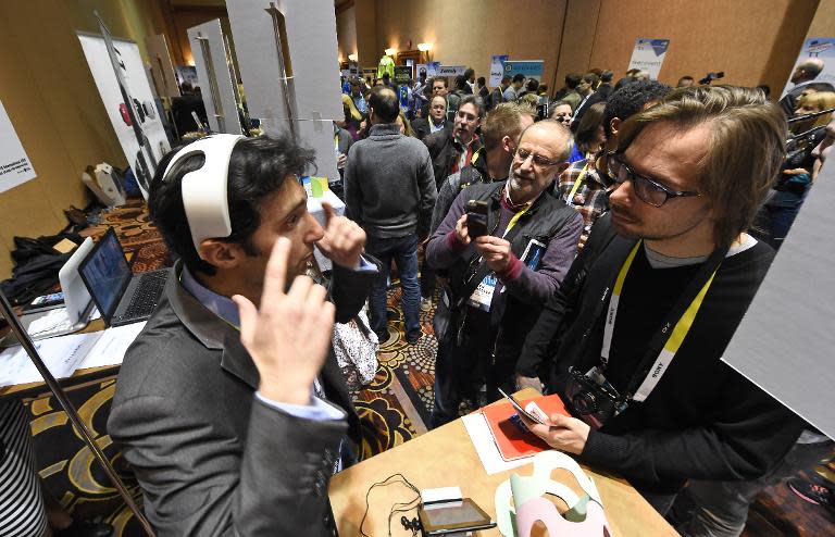 Yohan Attal of myBrain Technologies wears the Melomind headset at CES Unveiled, the opening event for the media preview days at the 2015 Consumer Electronics Show in Las Vegas, Nevada on January 4, 2015