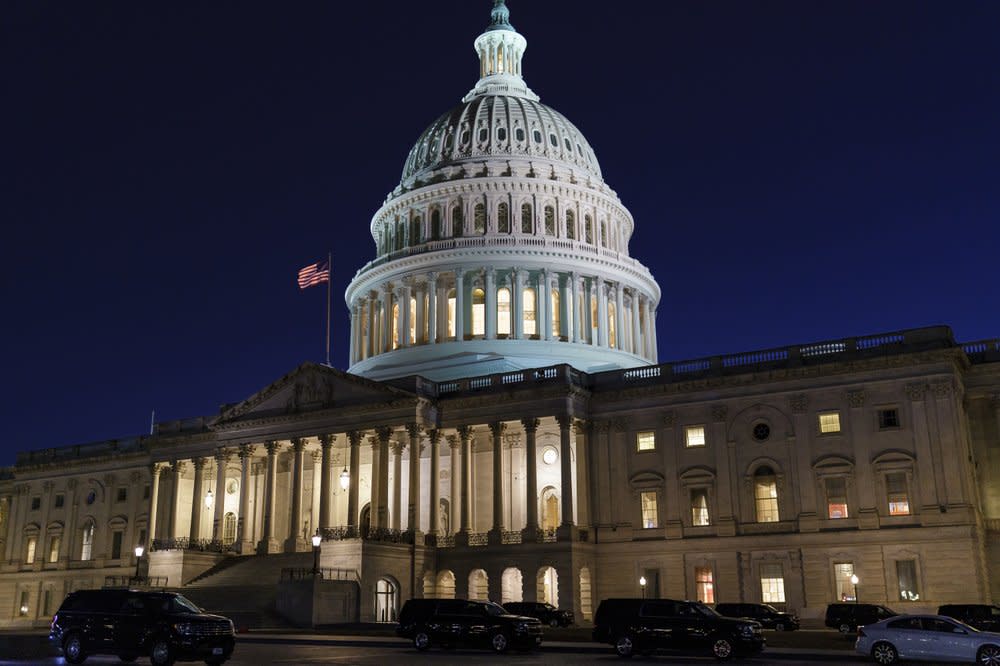 The Capitol is seen at dusk as work in the Senate is stalled on the Democrats’ $1.9 trillion COVID-19 relief bill, in Washington, Friday, March 5, 2021. (AP Photo/J. Scott Applewhite)