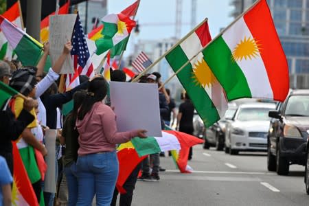 A crowd of over 500 people protest in support of Kurds after the Trump administration changed its policy in Syria