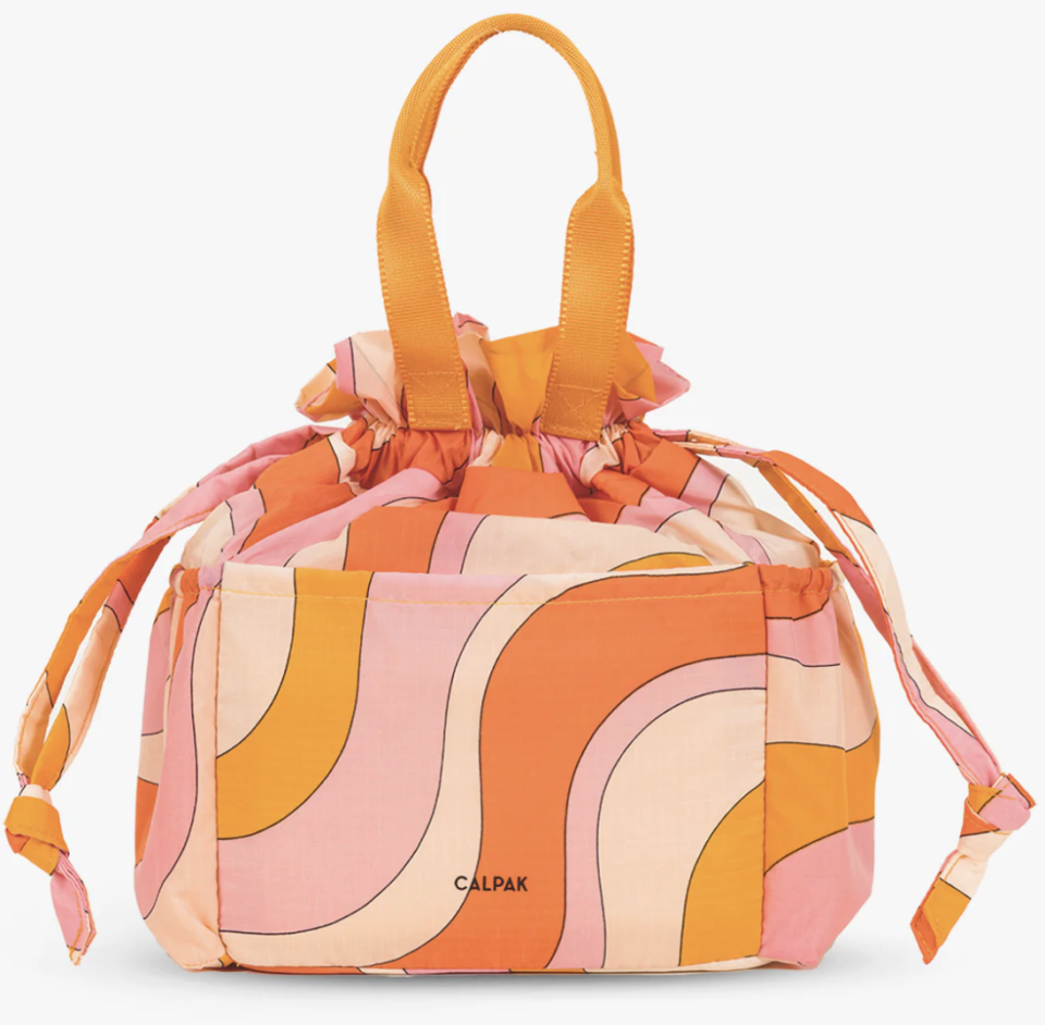 orange and pink swirl patterned lunchbox
