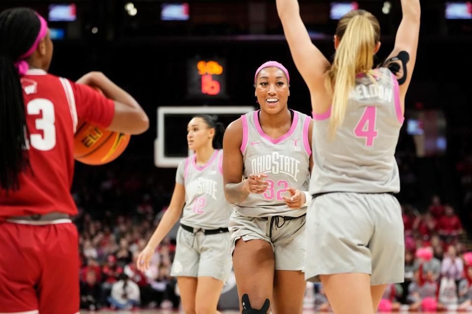 Feb 1, 2024; Columbus, OH, USA; Ohio State Buckeyes forward Cotie McMahon (32) celebrates a shot with guard Jacy Sheldon (4) during the second half of the NCAA women’s basketball game against the Wisconsin Badgers at Value City Arena. Ohio State won 87-49.