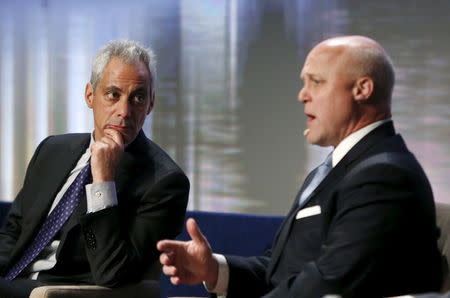 Chicago Mayor Rahm Emanuel (L) participates in a panel discussion on Reducing Violence and Strengthening Policy and Community Trust with New Orleans Mayor Mitch Landrieu (R) at the U.S. Conference of Mayors in Washington January 20, 2016. REUTERS/Gary Cameron