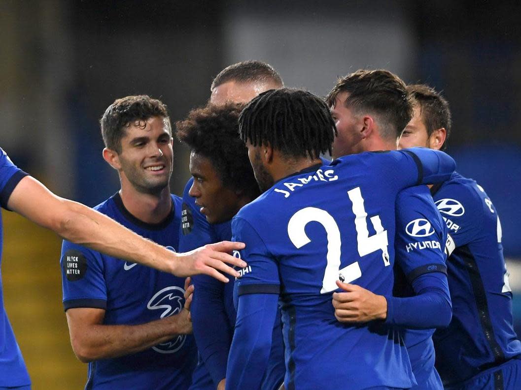 Chelsea celebrate after Willian doubles the lead: Getty