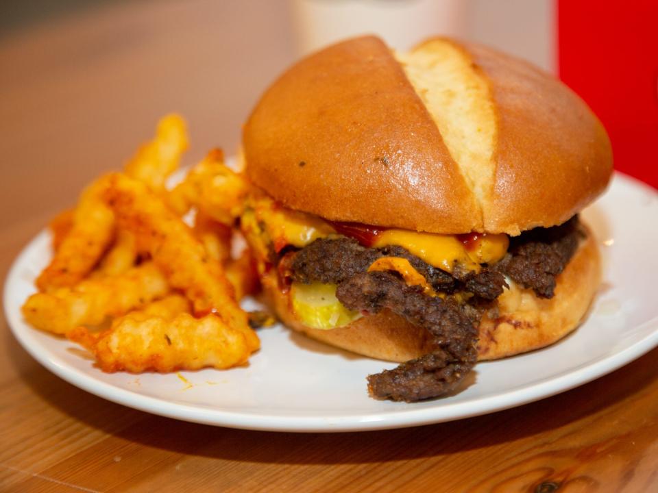 A burger and fries on a plate