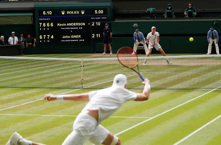 Tennis - Wimbledon - All England Lawn Tennis and Croquet Club, London, Britain - July 13, 2018 John Isner of the U.S. in action during his semi final match against South Africa's Kevin Anderson. REUTERS/Andrew Boyers