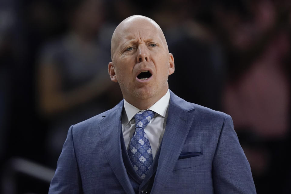 UCLA head coach Mike Cronin reacts during the first half of an NCAA college basketball game against Southern California, Saturday, Jan. 27, 2024, in Los Angeles. (AP Photo/Ryan Sun)