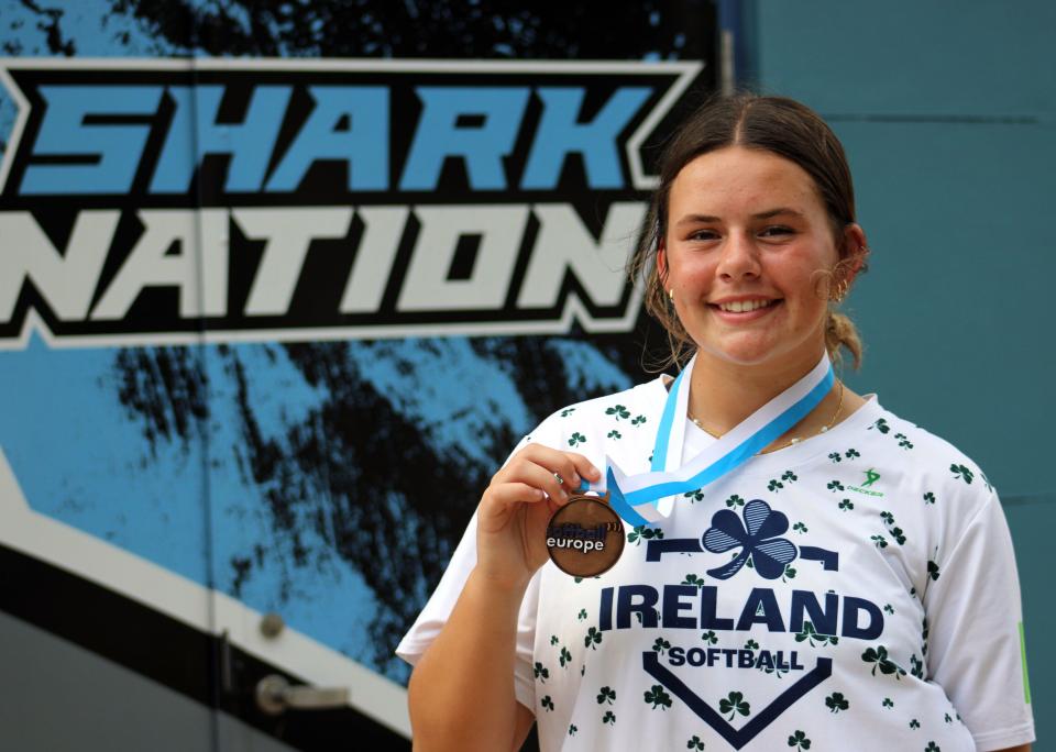 Ponte Vedra High School sophomore Aoife Weaver holds her bronze medal. The pitcher helped Ireland, the birthplace of her mother, to a third-place finish at August's European U18 softball championship in the Czech Republic.