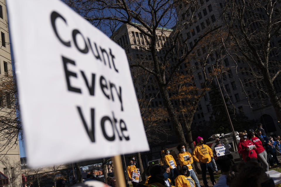 In this Nov. 4, 2020, photo, protestors attend a rally calling for every vote to be counted from the general election near the Detroit Department of Elections building in Detroit. President-elect Joe Biden shored up the Democrats' “blue wall,” — more sturdily in Michigan, more tenuously in Pennsylvania and Wisconsin — to rebuild the party's path back to the White House. AP Photo/David Goldman)