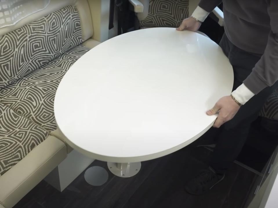 a person swiveling the table
