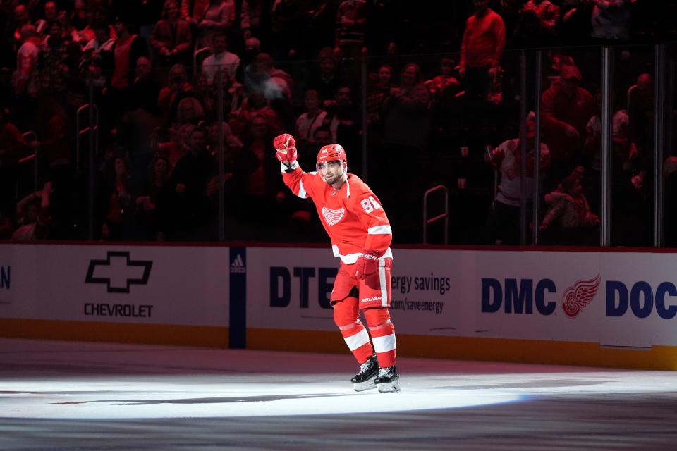 Detroit Red Wings defenseman Jake Walman (96) celebrates after beating the Vancouver Canucks in overtime at Little Caesars Arena in Detroit on Saturday, Feb. 10, 2024.