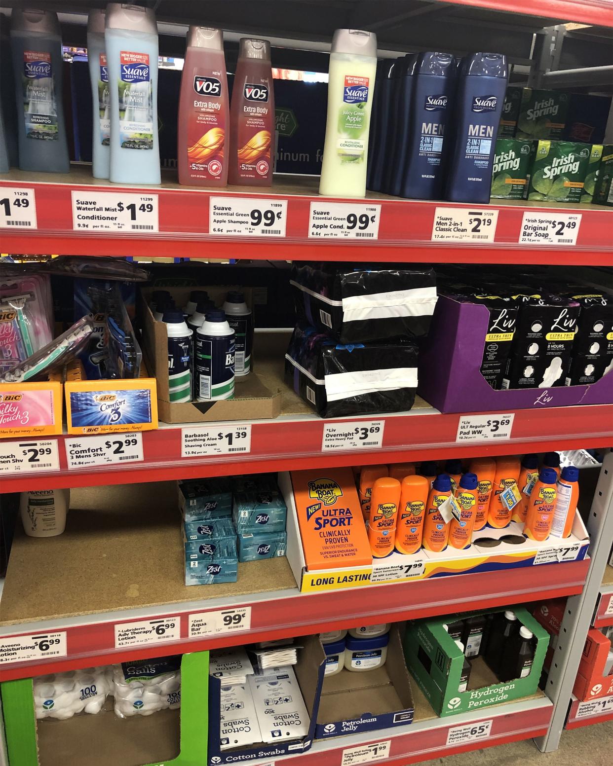 Personal care items section at Save A Lot, four rows of items including shampoo, sunscreen, soap, shaving