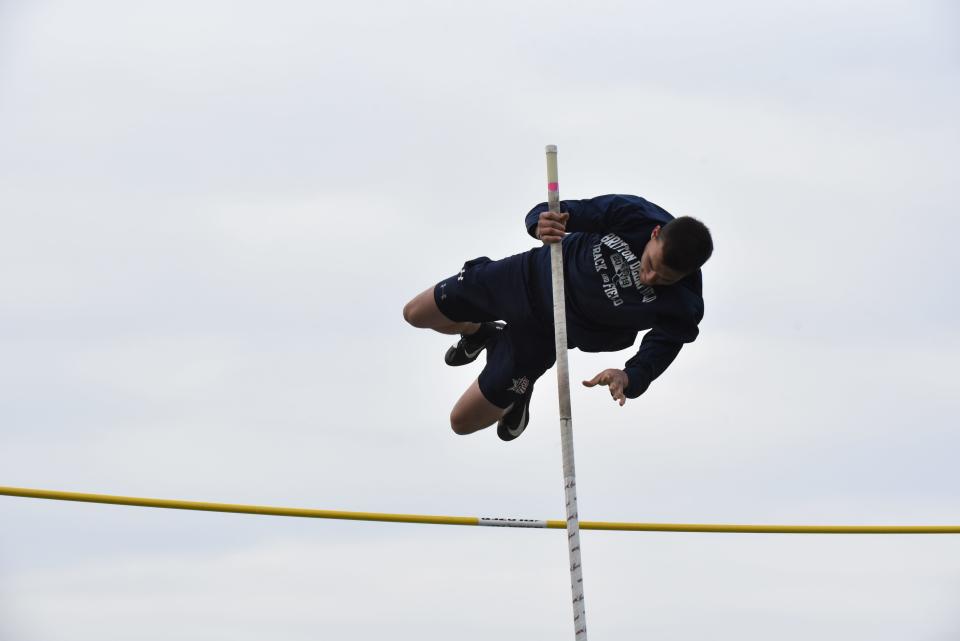 Britton Deerfield's Steven Martin clears the bar in the pole vault event Friday at the Hinsdale Invite at Sand Creek.