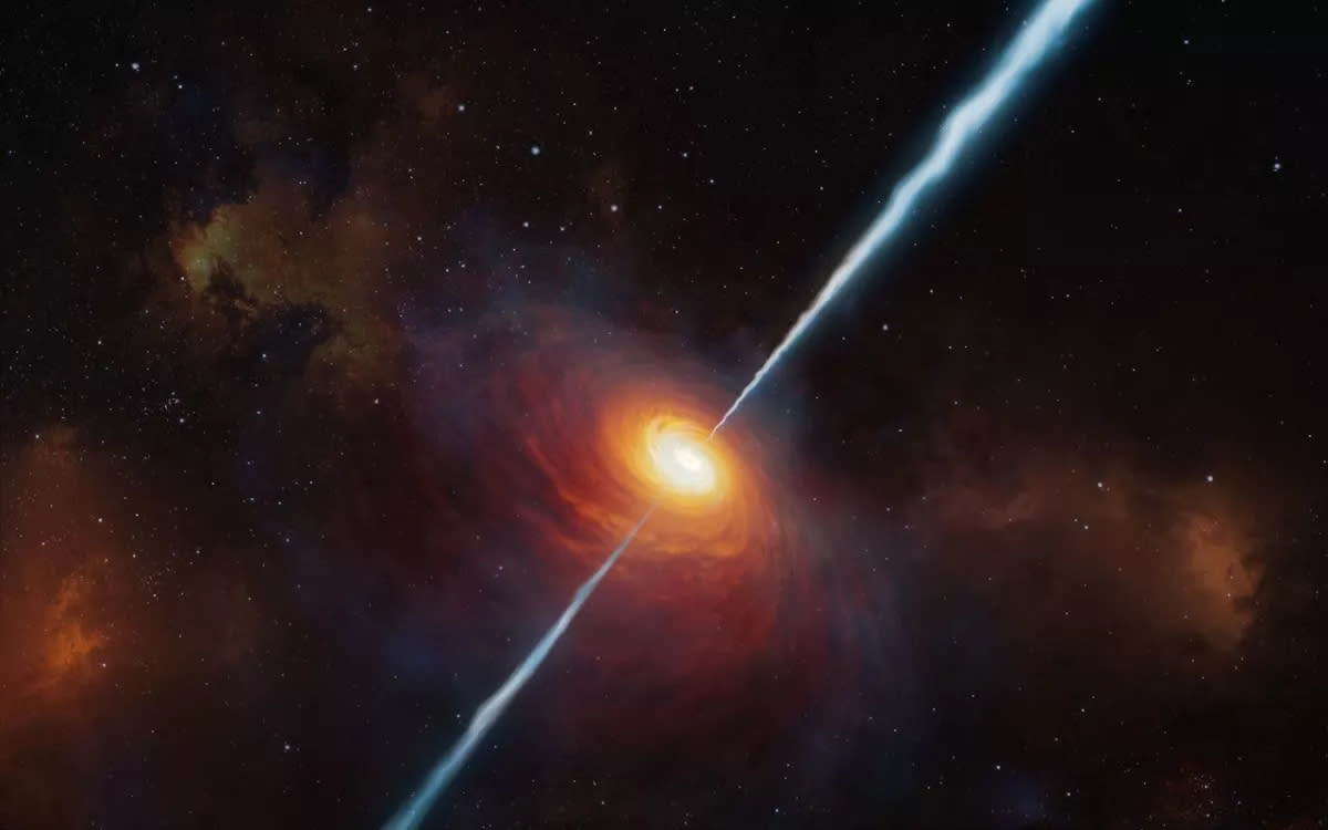  A quasar, which the new black hole is an early form of, blasting a jet of hot, radioactive wind into the cosmos. 