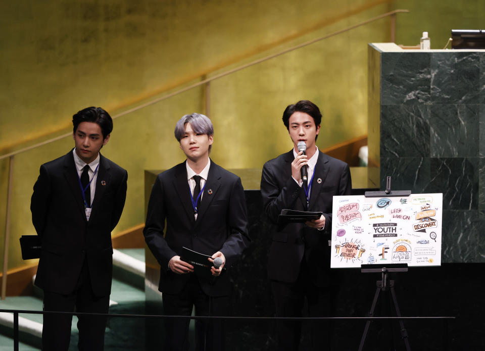 ADDS IDS - Members of of South Korean K-pop band BTS, from left, V, Suga and Jin appear at the United Nations meeting on Sustainable Development Goals during the 76th session of the U.N. General Assembly, at U.N. headquarters on Monday, Sept. 20, 2021. (John Angelillo/Pool Photo via AP)