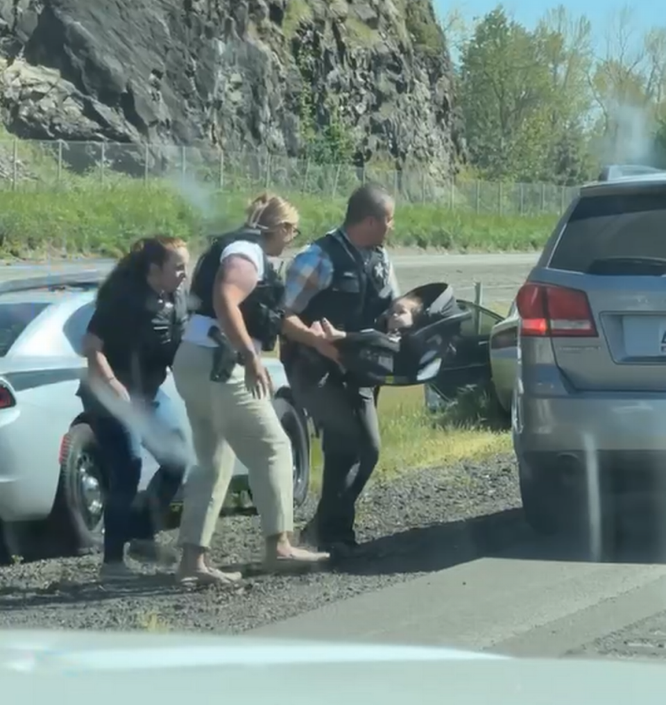 Oregon State Patrol Officers secure 1-year-old Roman Huizar after stopping Elias Huizar near Eugene, Oregon.