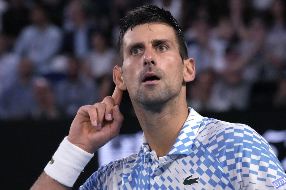 Novak Djokovic of Serbia reacts after winning the first set against Tommy Paul. (AP Photo/Aaron Favila)