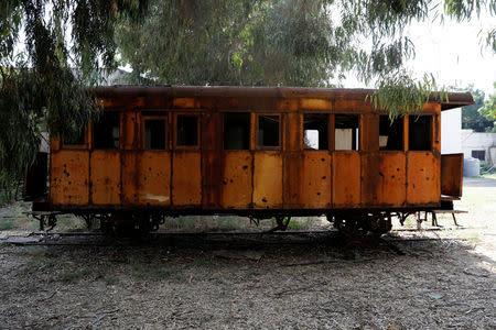 Shrapnel holes are seen on a rusted train on the remains of the old railway station in Beirut, Lebanon October 27, 2017. REUTERS/Jamal Saidi