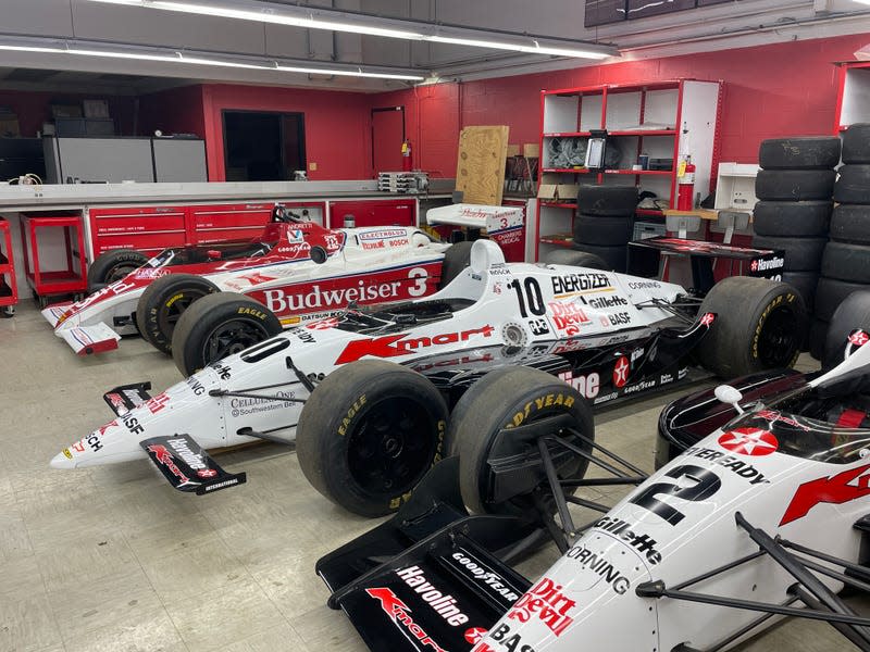 Three of driver Michael Andretti's Newman/Haas IndyCars, two sporting the Kmart Liveries