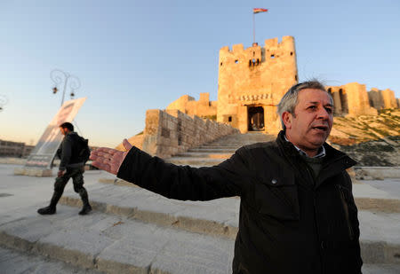 Maamoun Abdulkarim, Syria's director general of antiquities, speaks during an interview with Reuters outside Aleppo's ancient citadel, Syria February 1, 2017. REUTERS/Omar Sanadiki
