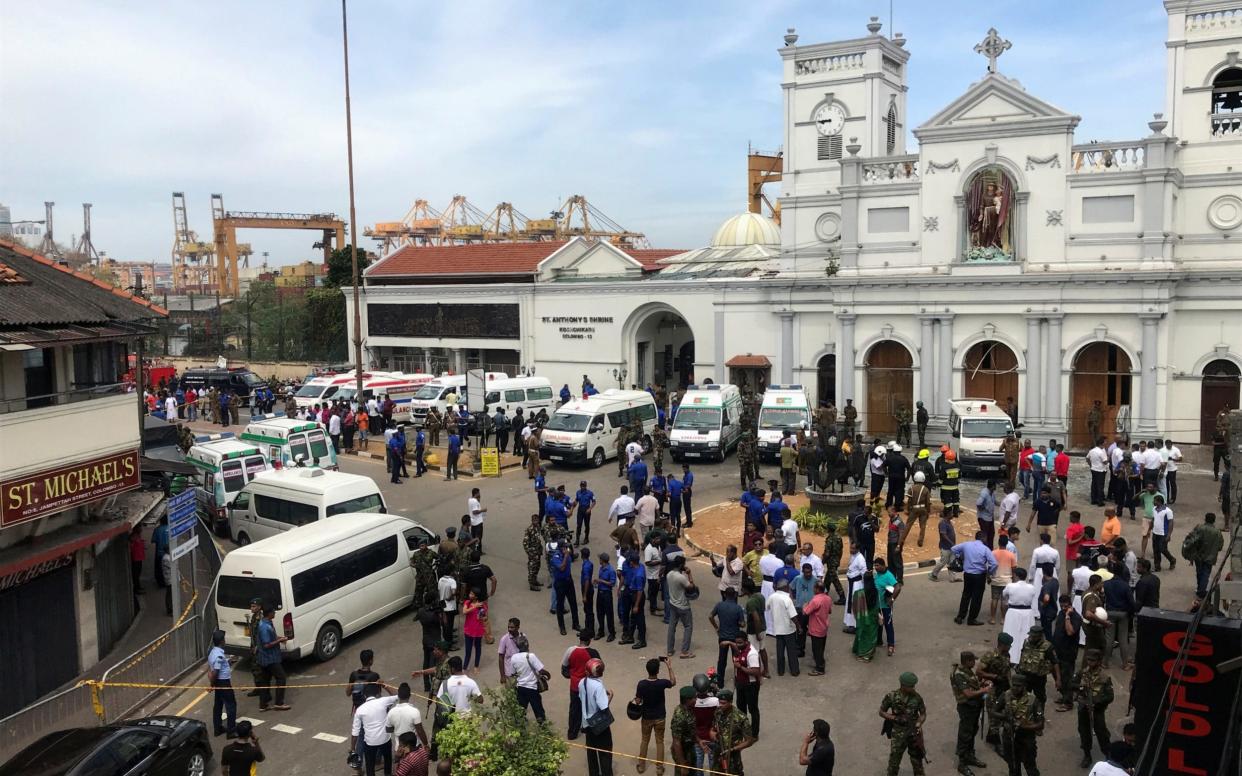 Sri Lankan military officials stand guard in front of the St. Anthony's Shrine, Kochchikade church after an explosion in Colombo - REUTERS