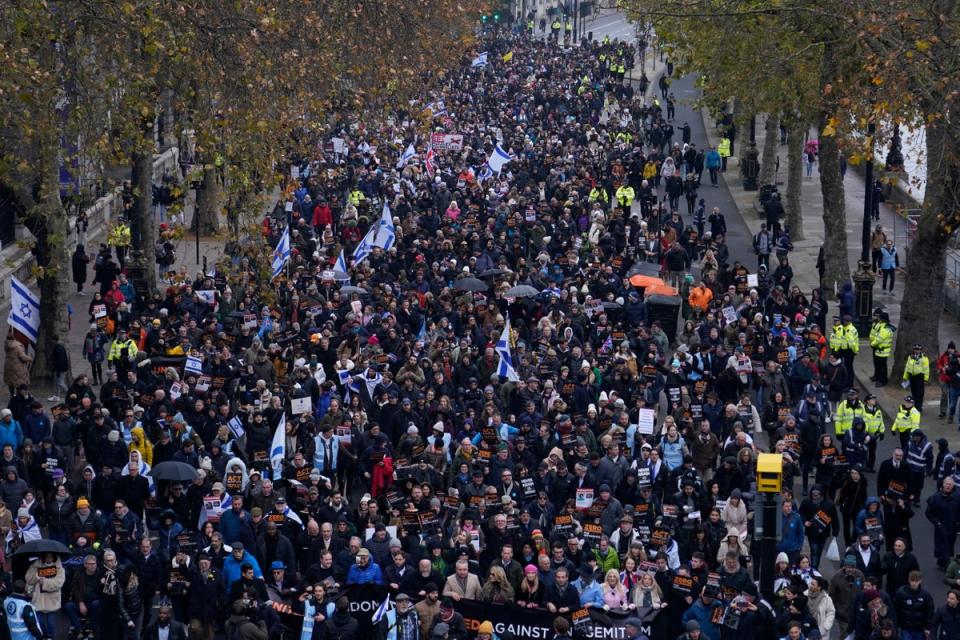 Thousands marched from the Royal Courts of Justice to Parliament Square (AP)