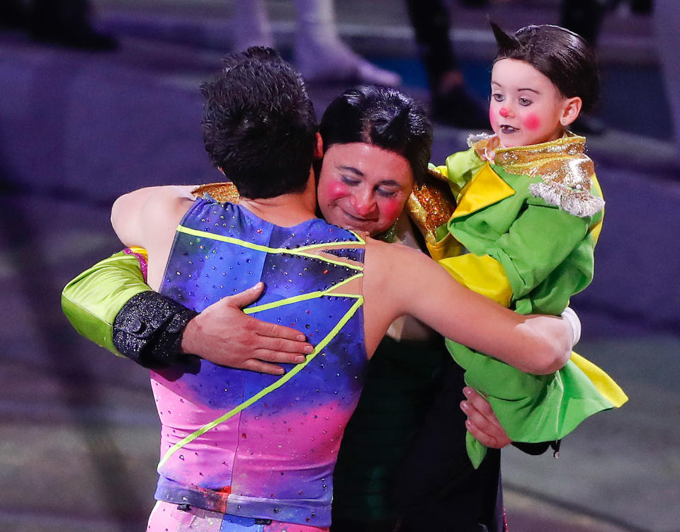 <p>Davis Vassallo, center, hugs a member of the trapeze troupe as he holds his daughter Adriana after the final show of the Ringling Bros. and Barnum & Bailey Circus, Sunday, May 21, 2017, in Uniondale, N.Y. (AP Photo/Julie Jacobson) </p>