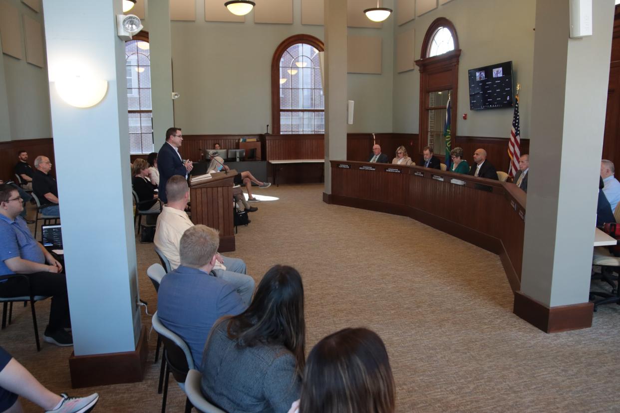 Tecumseh City Manager Dan Swallow addresses the Adrian City Commission during its special meeting Monday about Lenawee County's proposed Project Phoenix recreation and events center in Tecumseh.