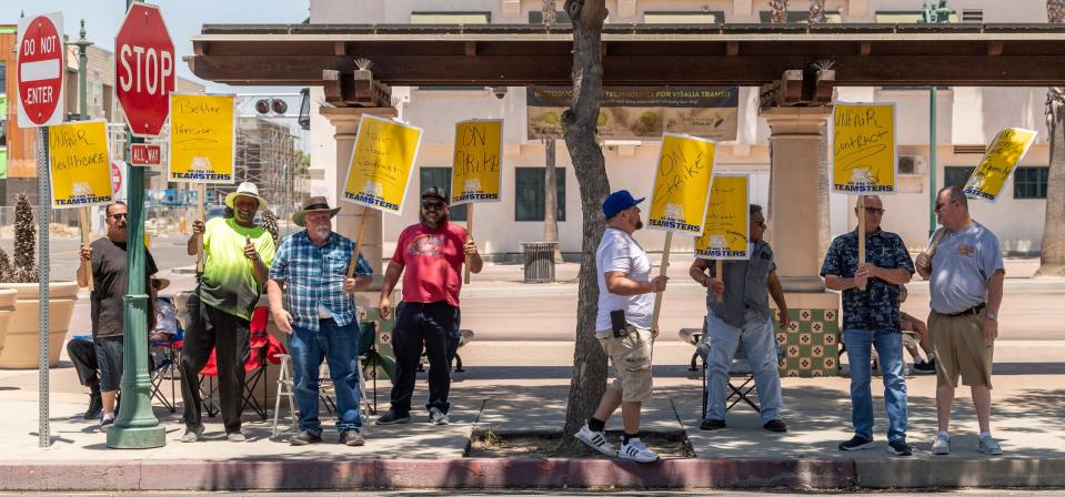 About 80 drivers, dispatchers, and others associated with Visalia Transit, protest Saturday, July 8, 2023 at the Transit Center to express expectations for better wages and other conditions from Transdev, the operator for Visalia Transit.
