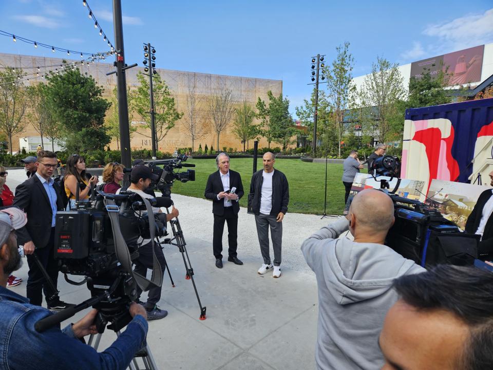 Carbonleo vice-president Claude Marcotte, left, and CEO Andrew Lutfy at a media event ahead of the mall opening.